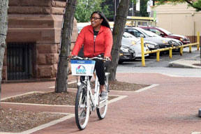 Mayor Warren riding Zagster bike