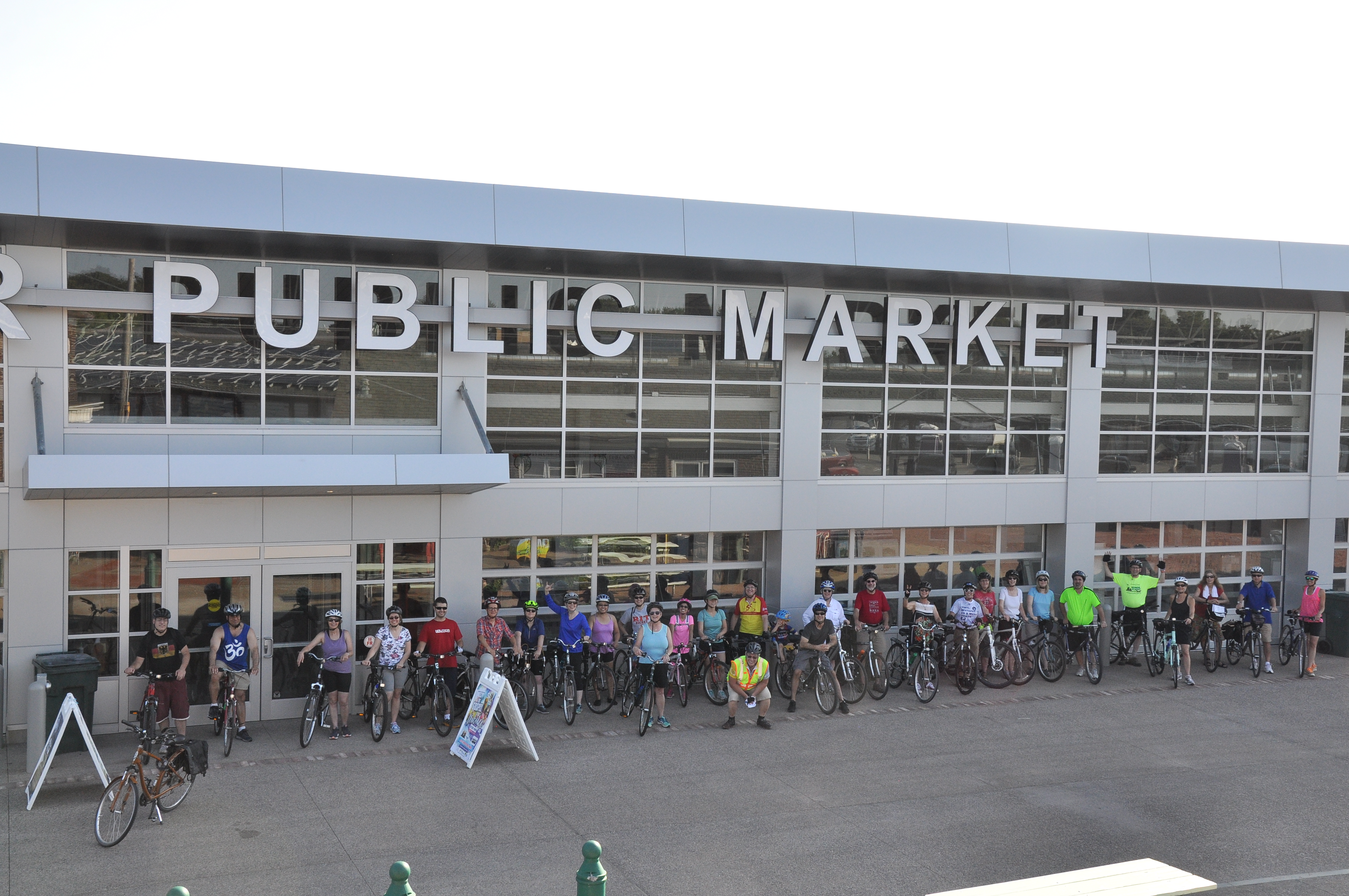 Photo of bicyclists at the Rochester Public Market.