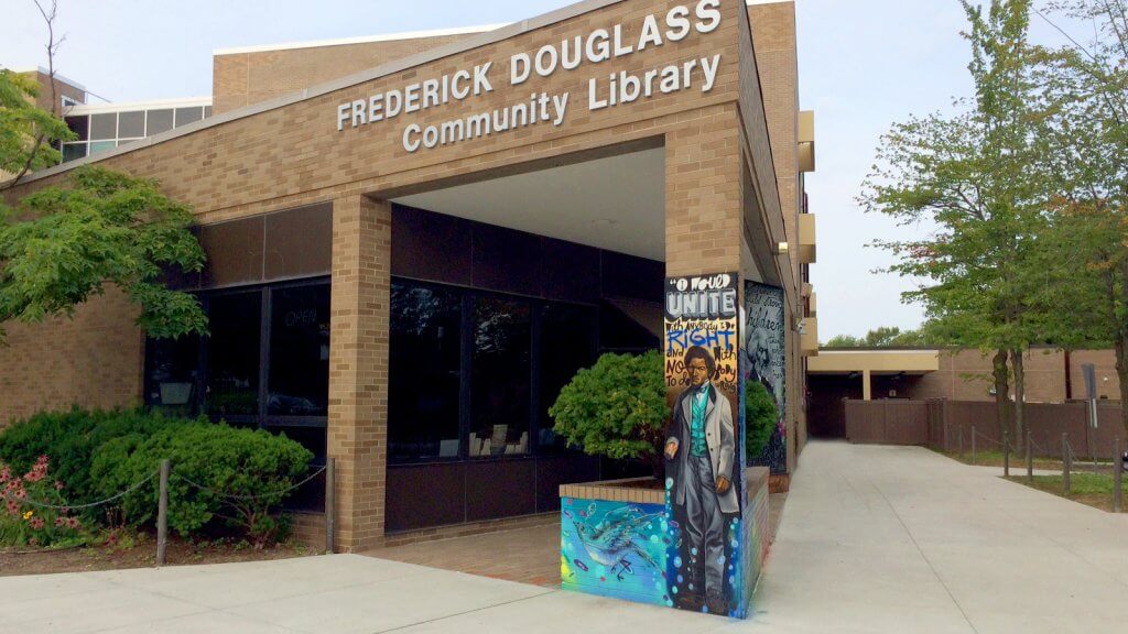 Exterior of Frederick Douglass Community Library. A brown-brick building.