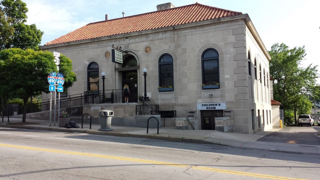 Exterior of Monroe Branch Library. A two-story, historic granite building.