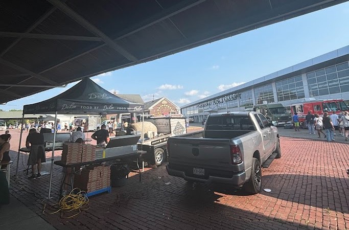 A photo of a truck parked at the Rochester Public Market.