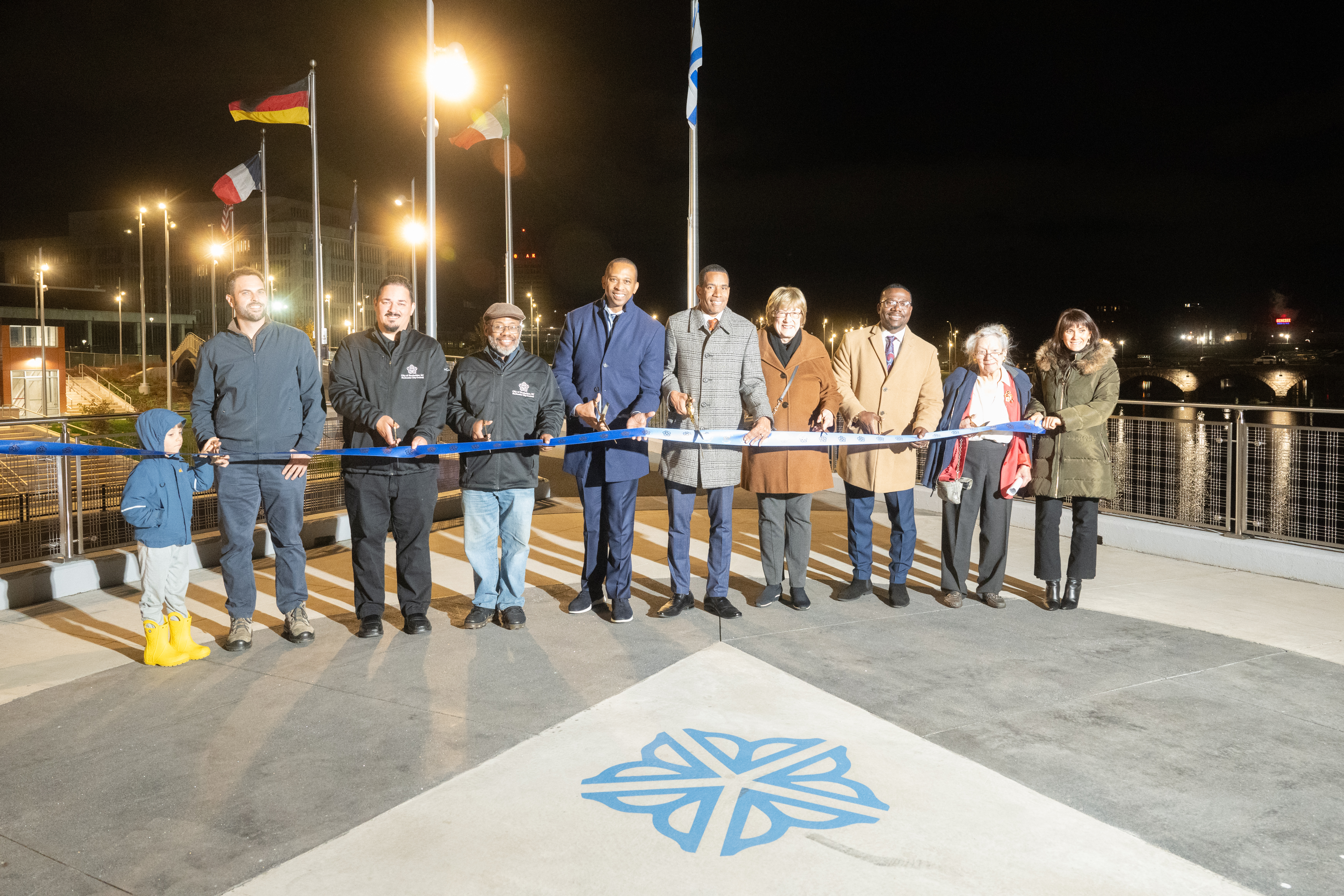 Photo of a ribbon cutting ceremony at Sister Cities Bridge.