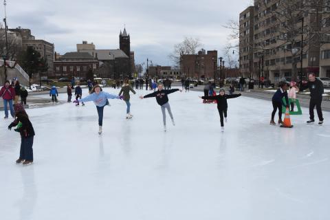 Photo of children ice skating at MLK Park in downtown Rochester.