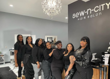 Photograph of people at Sew-N-City Hair Salon in Rochester.