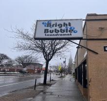 Photo of the exterior sign at Bright Bubble Laundromat.