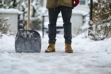 Getty Images photo of a person with a snow shovel.