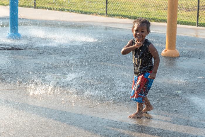 Photo a child at a Rochester spray park.