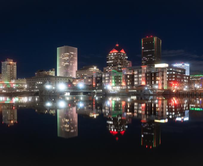 Photograph of the Rochester skyline at night.