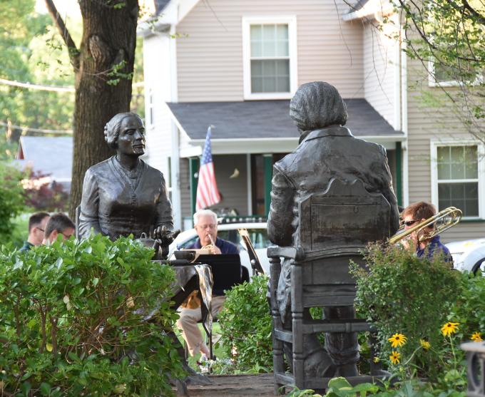 Photo of the "Let's Have Tea" statue in Susan B. Anthony Square Park.
