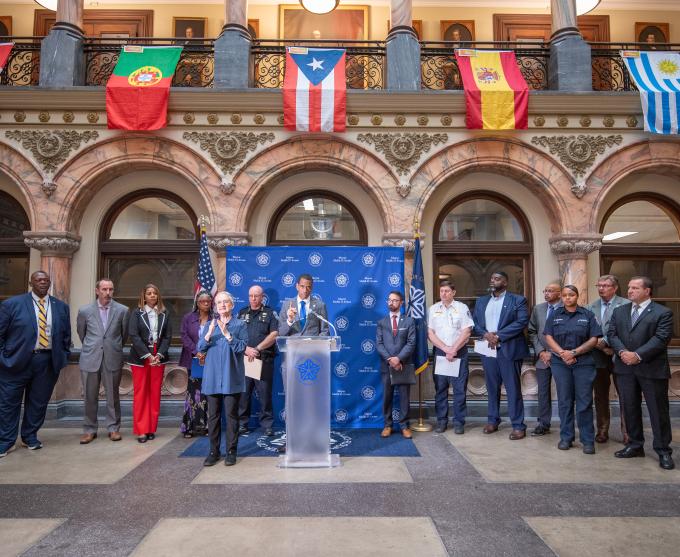 Photo of City leaders holding a press conference on public safety.