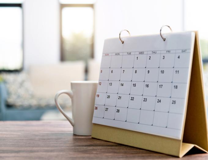 Photo of a calendar on a desk.