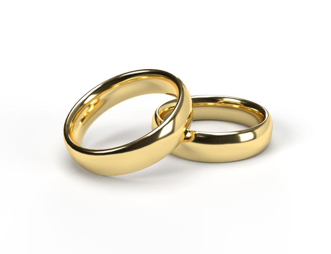 Photo of two golden wedding rings.