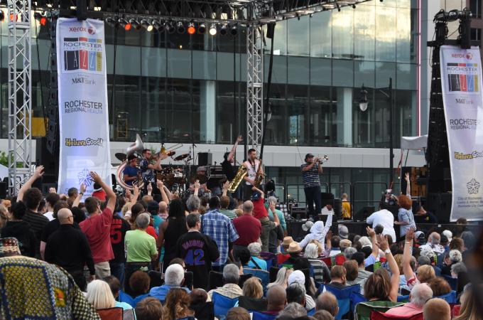 A photograph of the crowd at the Rochester Jazz Festival.