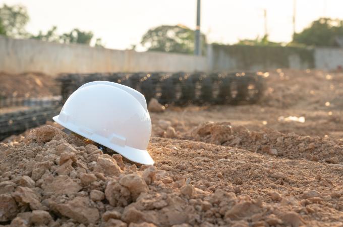 Photo of a hardhat at a construction site.